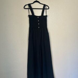Black Sleeveless Jumpsuit with Button Detail